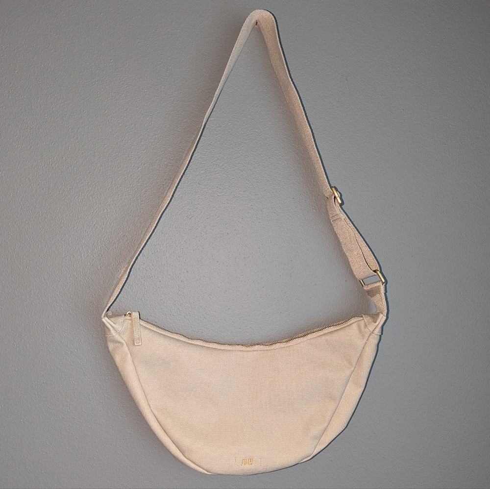 July Brand Canvas Oversized Sling In Taupe. Sling With Adjustable Strap.